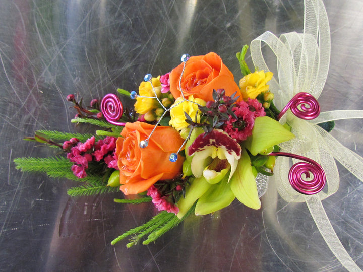 Dance corsage with specialty flowers, bling and ribbon