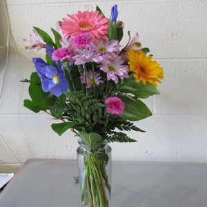 Fresh spring flower bouquet in glass vases